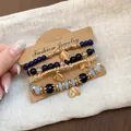 Retro ethnic style multi-layer beaded bracelet set with gold leaf charms on card - Leaf / Four-Piece Set / Gold-Dark Blue