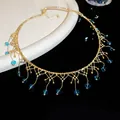 Collier ras du cou doré en dentelle avec pompons en perles de cristal bleu pour SKU - Ton Or Avec Strass Bleu