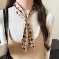 Retro plaid fabric silk scarf necklace with a gold metallic slider for a minimalist look. - Brown Argyle