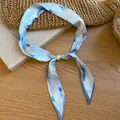 Vintage style silk scarf necklace with blue landscape print and pearl accessory. - Blue Landscape Ink Print Style / Necklace-Blue-Printed