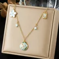 Gold-plated stainless steel necklace featuring light blue floral and beaded pendants. - Light Blue Cloisonne Plant Texture Style (N4566)
