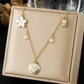 Gold-plated stainless steel necklace with white enamel floral charms and beaded drops - White Five Petal Flower Enamel Multi Charm (N4567)