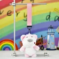 Detailed view of a cute pink and white plush dog pendant with a sturdy pink fabric strap - Big Nose Dog - Short Ear White Pink (Colored Strap)