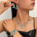 Western cowboy jewelry set with turquoise charms and beads shown on a model - Artificial Turquoise Western Necklace Bracelet & Earrings 3-Piece Set (15)