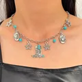 Close-up view of Western cowboy charm necklace featuring turquoise beads and silver stars - Artificial Turquoise Western Pendant Necklace (DZ-397)