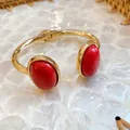 Detailed view of luxury gold geometric bangle featuring two large marbled red oval stones - Dual Red Gem Decor Style (7#) / Gold-Red