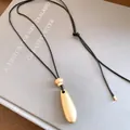 Minimalistische mat goudkleurige druppelhanger ketting met verstelbaar zwart koord sieraad - Matte Waterdruppel-Goud-Zwart Koord