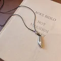 Collana con ciondolo a goccia d'argento minimalista con cordino nero - Argento Nero Lucido (54#)