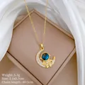 Close-up of gold-plated astronaut moon necklace with blue starry stone and crystals - 宇航员弯月款式(A429) / 1 Piece / Gold