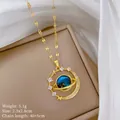 Detailed view of titanium steel planet necklace with blue starry stone and crystals - 土星形象款式(F224) / 1 Piece / Gold