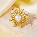 Detailed view of an 18K gold-plated sunburst ring featuring a central white pearl inlay. - Artificial Pearl Sunburst Ring (A710 Gold Sun Ring) / One Size (A710) / Gold
