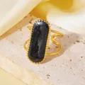 Close-up of 18K gold plated titanium steel ring with large oval black druzy stone. - Black Starry Oval Ring (A710 Gold Black Oval Ring) / One Size (A710) / Gold