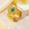 Detailed close-up view of a vintage 18K gold plated wide ring featuring a green malachite stone - Round Shield Sunburst Ring (A710 Gold Green Round Disk Ring) / One Size (A710) / Gold