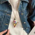 Collana etnica retrò fatta a mano con bottone in legno e ciondolo a stella colorata - Caffè Colorato (57#)