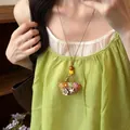 Collana etnica fatta a mano con ciondolo a cesto intrecciato e fiori colorati - Cesto di Fiori in Paglia (61#)