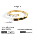 Anello regolabile in acciaio inossidabile dorato con zirconi baguette neri e bianchi - Stile Aperto Zirconia Baguette Bianco e Nero (JDR0304301) / Oro