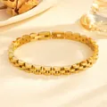 Macro view showing the polished gold-plated stainless steel fish scale link bracelet texture - Fish Scale Bracelet (G805) / 6mm Width / Gold