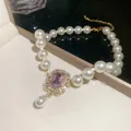 Elegante Perlenkette mit rosa Edelstein-Anhänger und goldfarbenen Details in Nahaufnahme. - 25# Halskette Rechteckiger Edelstein-Perlenanhänger