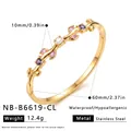 Close-up detail of a gold-plated stainless steel branch bracelet with colorful zircons - White Rhinestone Style (NB-B6619-CL) / 18K Gold