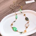 Lange Perlenkette mit grünen Muschel-Akzenten und bernsteinfarbenen Perlen - Böhmische Grüne Serie Langer Perlen-Stil(68#) / Grün-Gold