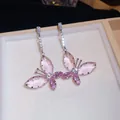 Elegante roze vlinder oorbellen met sprankelende zirkoon accenten in zilveren finish - Zilver Roze Vlinder Lange Hanger Stijl (60#) / Zilver-Roze