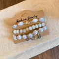 Detailed view of Bohemian three-piece bracelet set with marble beads and silver charms - Style 11#