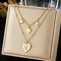 Close-up detail of double-layered gold-plated stainless steel heart and clover necklace - Pink and White GOODLUCK Heart Clover Layered Chain (N4562)