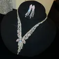 Detailweergave van een elegante zirkon-kwastjesketting en oorbellen set met roze stenen - Ketting En Oorbellen (29#) / 2-delige set / Zilver-Roze