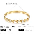 Detail shot of a gold stainless steel bangle with zircon accents and size measurements. - White Zirconia Inlaid Style (NB-B6631-WT) / 18K Gold