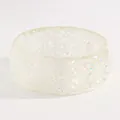 Detailed view of iridescent white resin wide bangle with holographic flakes - Triangular Sequin Round (M-641) / White