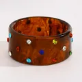 Detailed view of vintage tortoiseshell resin bangle decorated with vibrant multi-color crystals - Studded Miscellaneous Style (K-048) / Dark Coffee