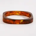Close-up of vintage marbled amber resin wide bangle showing unique swirl patterns - Small Square (M-186) / Amber