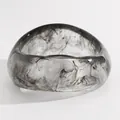 Detailed view of a vintage resin bangle featuring an artistic black ink wash marble pattern - Twisted (A-1177) / Gray
