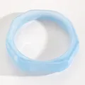 Close-up of light blue marbled resin bangle with unique hexagonal geometric shape - Octagonal Style (WG-1065) / Blue