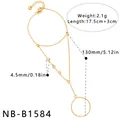 Bracelet bague en acier inoxydable doré avec zircons et dimensions détaillées. - Style à Quatre Zircones (NB-B1584)