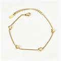 Elegant gold stainless steel bracelet featuring four dainty heart charms for women - Gold Bracelet (B108)