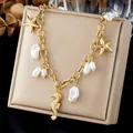 Close-up of gold-plated chunky chain necklace with seahorse, starfish charms and pearls - Gold Thick Chain Seahorse Sea Star Artificial Pearl (N4571)