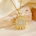 Macro detail of a gold sunburst flower pendant necklace with shimmering cubic zirconia - Gold Sun Flower Style (T084)