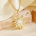 Close-up view of a gold sunburst pendant featuring star patterns and shimmering crystals - Gold Six White Rhinestones Sun Style (T084)