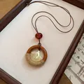 Vintage ginkgo leaf pendant necklace featuring a resin ring and rustic jute wrap detail - Ginkgo Leaf Style (40#) / Gold/Coffee