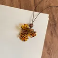 Vintage resin flower pendant necklace with leopard print on a natural wooden background - Leopard Print Petal Style (64#) / Coffee