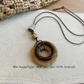 Retro geometric long necklace with resin and woven rings on beige fabric background - Grass Woven and Resin Ring Style (16#) / Coffee