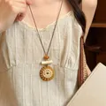 Vintage resin sunflower pendant necklace on a brown cord, long sweater chain - Sunflower Collage Style (27#) / Coffee/White