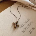 Retro resin geometric pendant necklace on a brown cord with a realistic tiger eye texture - Tiger Eye Texture Geometric Style (38#) / Coffee