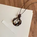 Retro resin necklace featuring a leopard print geometric pendant on dark brown cord - Leopard Silver Teardrop Style (60#) / Coffee/Silver