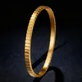 Elegant gold geometric titanium steel bangle with rectangular textured pattern for women - Square Grid (40-B-8) / Gold