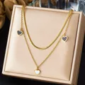 Collana a doppio strato placcata in oro con eleganti ciondoli a cuore su maglia e serpente - Stile Catena a Serpente a Doppio Strato con Tre Ciondoli a Cuore (N4097) / Oro