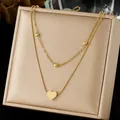 Elegante collana a due strati placcata in oro con ciondolo a cuore lucido e perline. - Stile Ciondolo a Cuore con Perle Tonde a Doppio Strato (N4171) / Oro