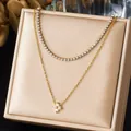 Elegante collana a doppio strato placcata oro con strass scintillanti e ciondolo a fiore - Stile Fiore a Quattro Petali con Catena Tennis in Strass a Doppio Strato (N4088) / Oro