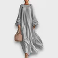 Macro view showing tiered ruffle sleeves on a grey long-sleeve loose maxi dress - XS / Dresses / Gray